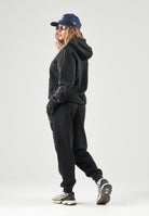 PUMA Pantalone DARE TO PRINTED  nero per donna con dettagli animalier sui fianchi e caviglie elasticizzate. 637612 01 PUMA 