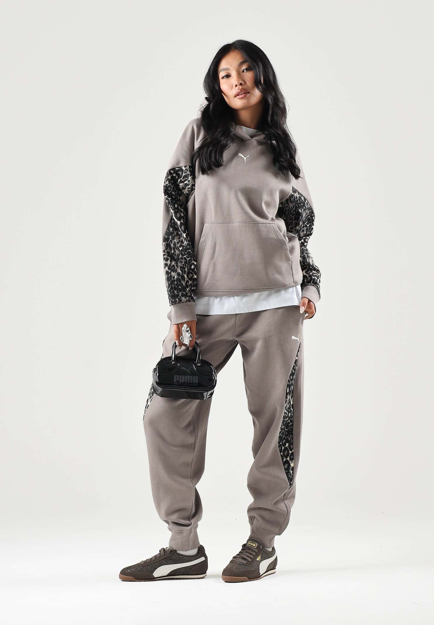 PUMA Pantalone DARE TO PRINTED beige per donna con dettagli animalier sui fianchi e caviglie elasticizzate. 637612 81 PUMA 