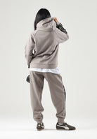 PUMA Pantalone DARE TO PRINTED beige per donna con dettagli animalier sui fianchi e caviglie elasticizzate. 637612 81 PUMA 