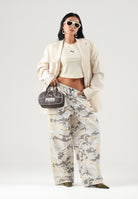 PUMA Pantalone DARE TO CAMO giallo da donna con motivo mimetico sfumato 638346 88 PUMA 
