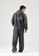 PUMA Pantaloni DARE TO WASHED grigio antracite per uomo con finitura effetto vissuto e maxi grafica 638731 01 PUMA 