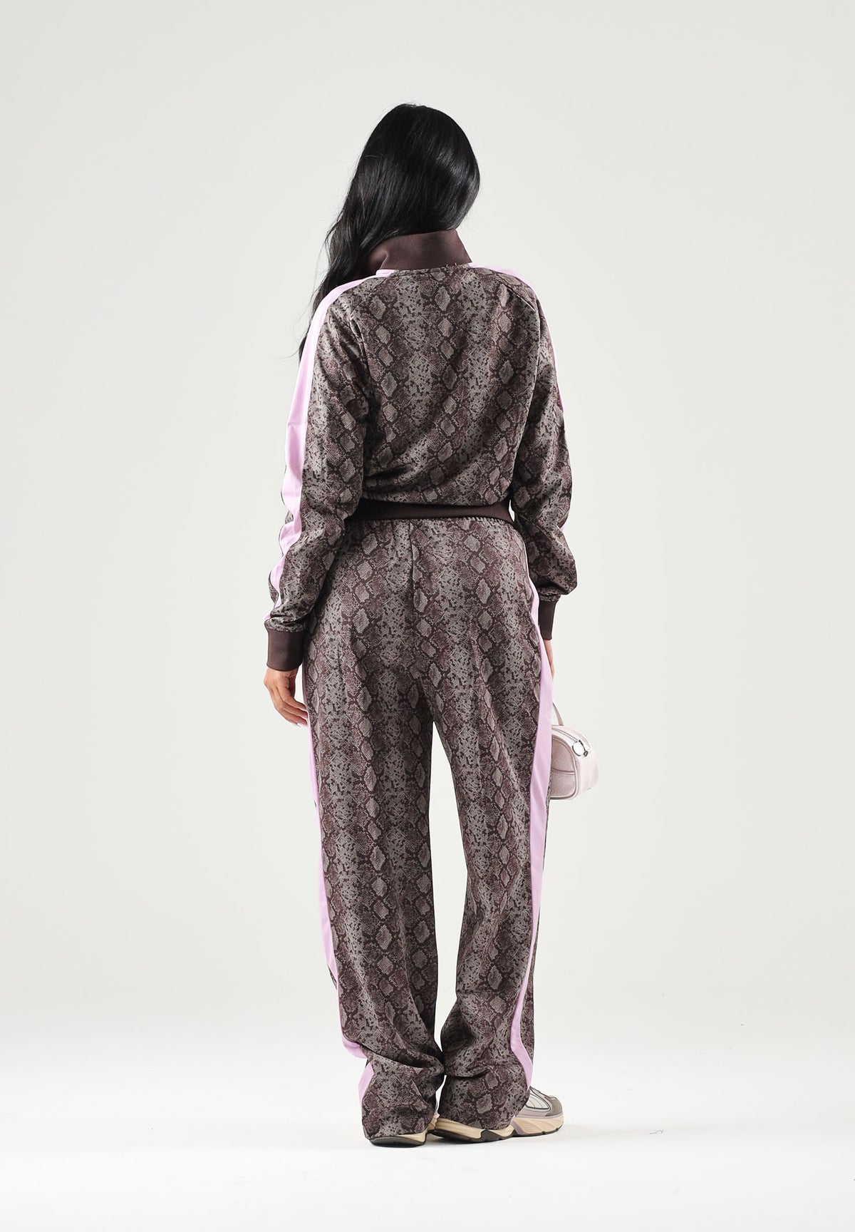 PUMA Pantalone PYTHON PRINT TRACK PANTS marrone e rosa da donna con stampa pitonata 638733 33 PUMA 