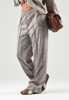 PUMA Pantalone PYTHON PRINT TRACK PANTS beige  da donna con stampa pitonata 638733 81 PUMA 