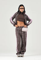 PUMA Felpa con zip PYTHON PRINT TRACK JACKET marrone e rosa da donna con fantasia pitonata 638737 33 PUMA 