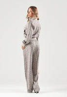 PUMA Felpa con zip PYTHON PRINT TRACK JACKET beige da donna con fantasia pitonata 638737 81 PUMA 