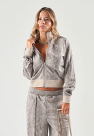 PUMA Felpa con zip PYTHON PRINT TRACK JACKET beige da donna con fantasia pitonata 638737 81 PUMA 