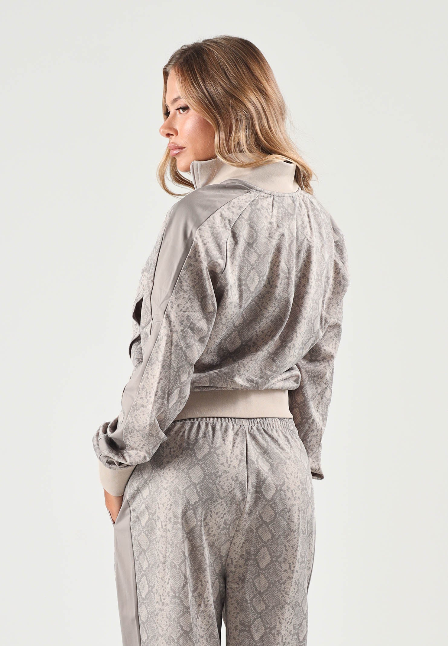PUMA Felpa con zip PYTHON PRINT TRACK JACKET beige da donna con fantasia pitonata 638737 81 PUMA 