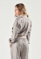PUMA Felpa con zip PYTHON PRINT TRACK JACKET beige da donna con fantasia pitonata 638737 81 PUMA 