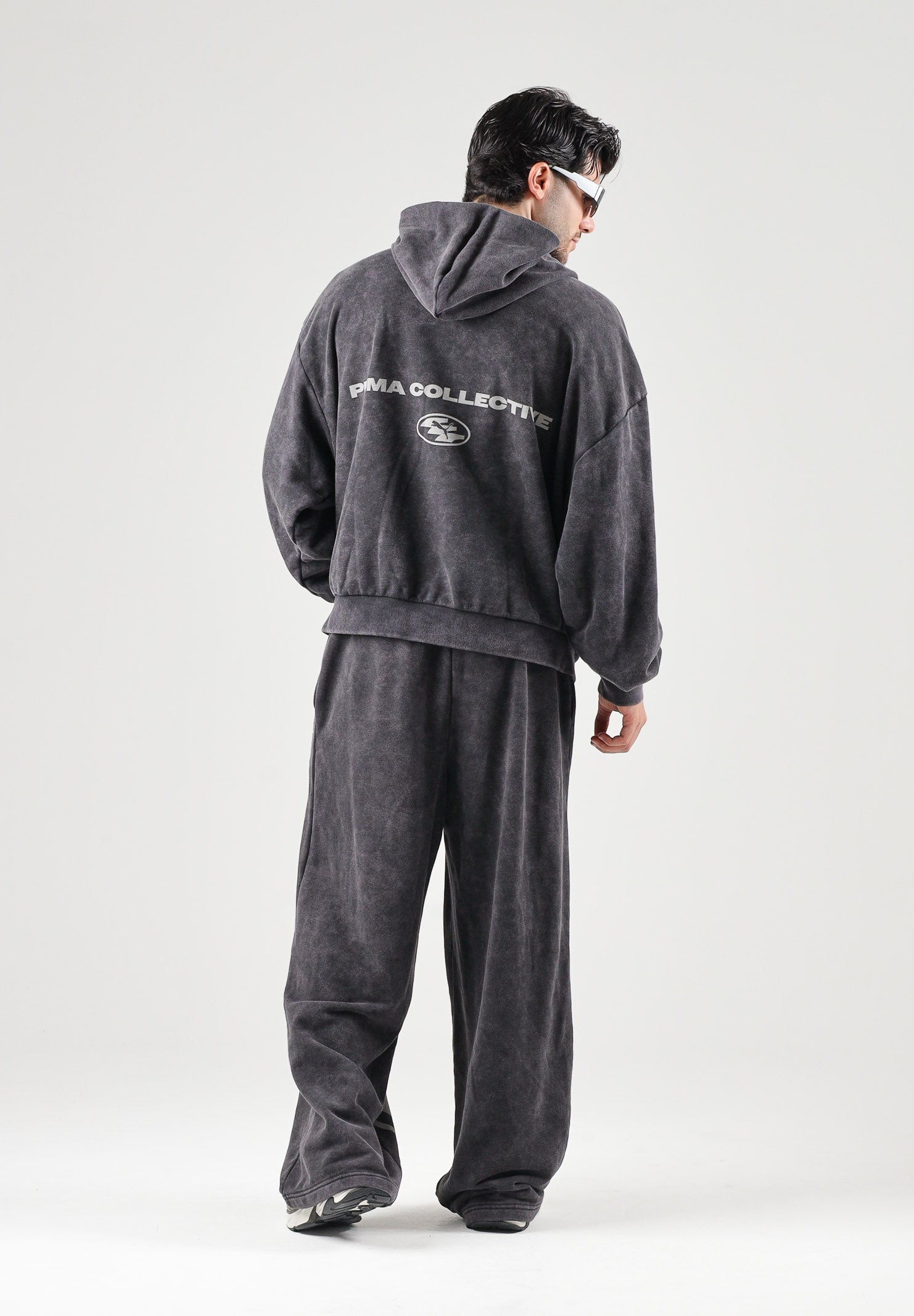 PUMA Felpa con cappuccio DARE TO WASHED nera per uomo e donna con trattamento di lavaggio vintage 638738 01 PUMA 