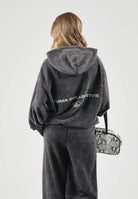 PUMA Felpa con cappuccio DARE TO WASHED nera per uomo e donna con trattamento di lavaggio vintage 638738 01 PUMA 