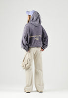 PUMA felpa con cappuccio DARE TO WASHED HOODIE viola slavato da uomo e donna in pesante tessuto felpato di puro cotone, con particolare lavaggio vintage,  spalle scese, cappuccio senza coulisse, tasca frontale a marsupio, polsini e fondo a costine e  638738 35 PUMA 