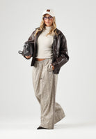 PUMA Pantaloni T7 RELAXED SNAKE beige da donna con motivo animalier e laccetti sul fondo 638743 81 PUMA 