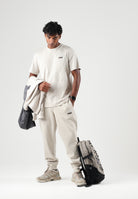 PUMA T-shirt manica corta ESS Small  beige chiaro da uomo con logo ricamato sul petto 684717 92 PUMA 