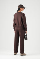 PUMA Tuta DOWNTOWN SWEATSUIT marrone per donna con mini logo iconico laterale 693995 33 PUMA 