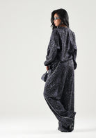 PUMA Pantalone RUN WOVEN PANTS grigio per donna con trama grafica, vita elastica e fondo stringabile. 694005 35 PUMA 