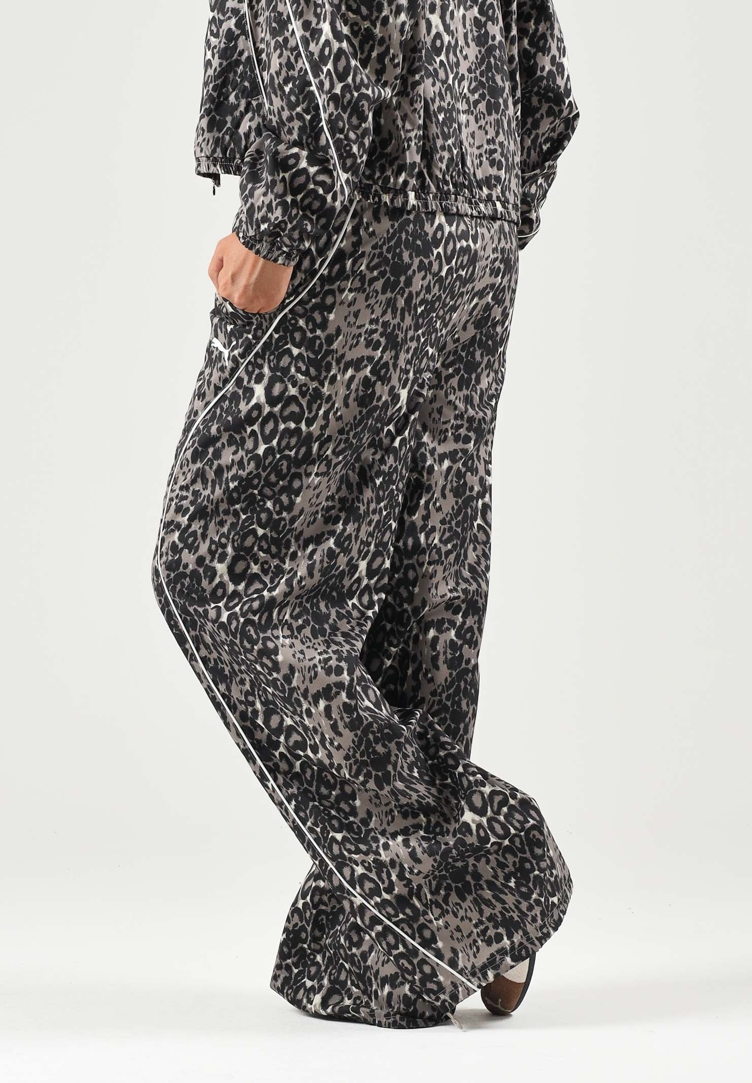 PUMA Pantalone RUN WOVEN PANTS beige per donna con trama grafica, vita elastica e fondo stringabile. 694005 81 PUMA 