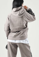 PUMA Felpa con cappuccio RUN HOODIE beige  da donna con inserti manica stampati 694007 81 PUMA 