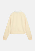 PUMA Felpa girocollo INFUSE RUGBY giallo-burro da donna con colletto polo a contrasto, bottoni coperti e polsini a costine. 694011 88 PUMA 