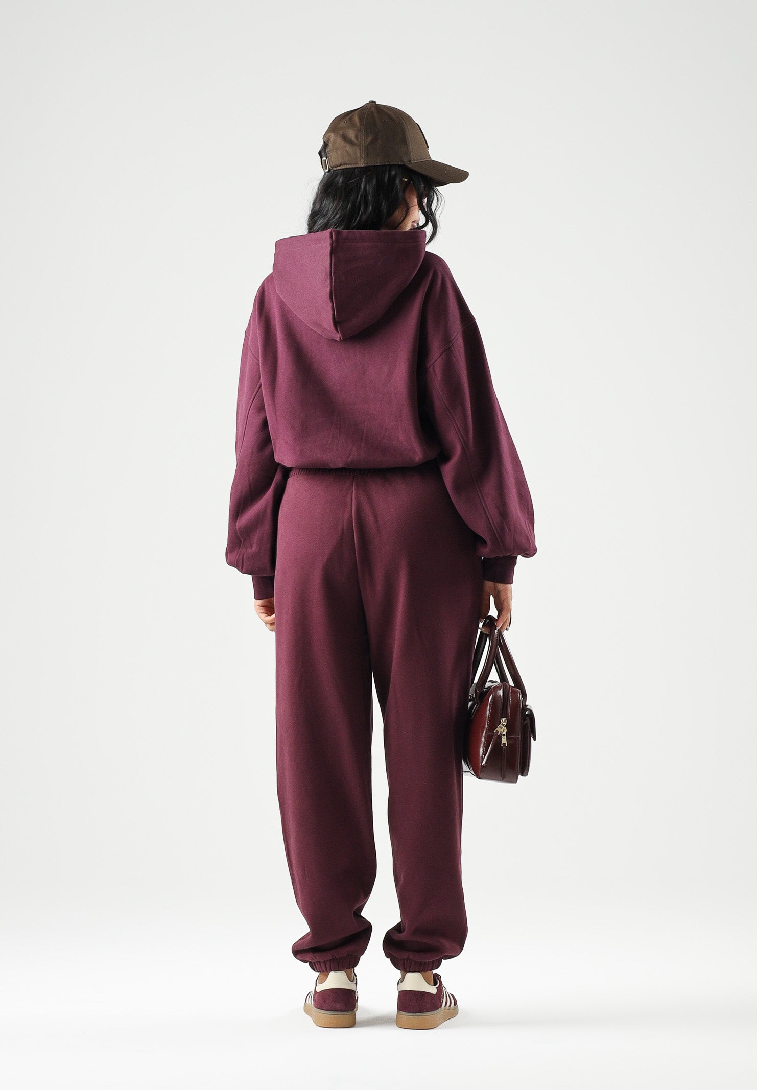 PUMA Felpa con cappuccio HOODIE bordeaux da donna con maniche a palloncino<BR/> 694027 24 PUMA 