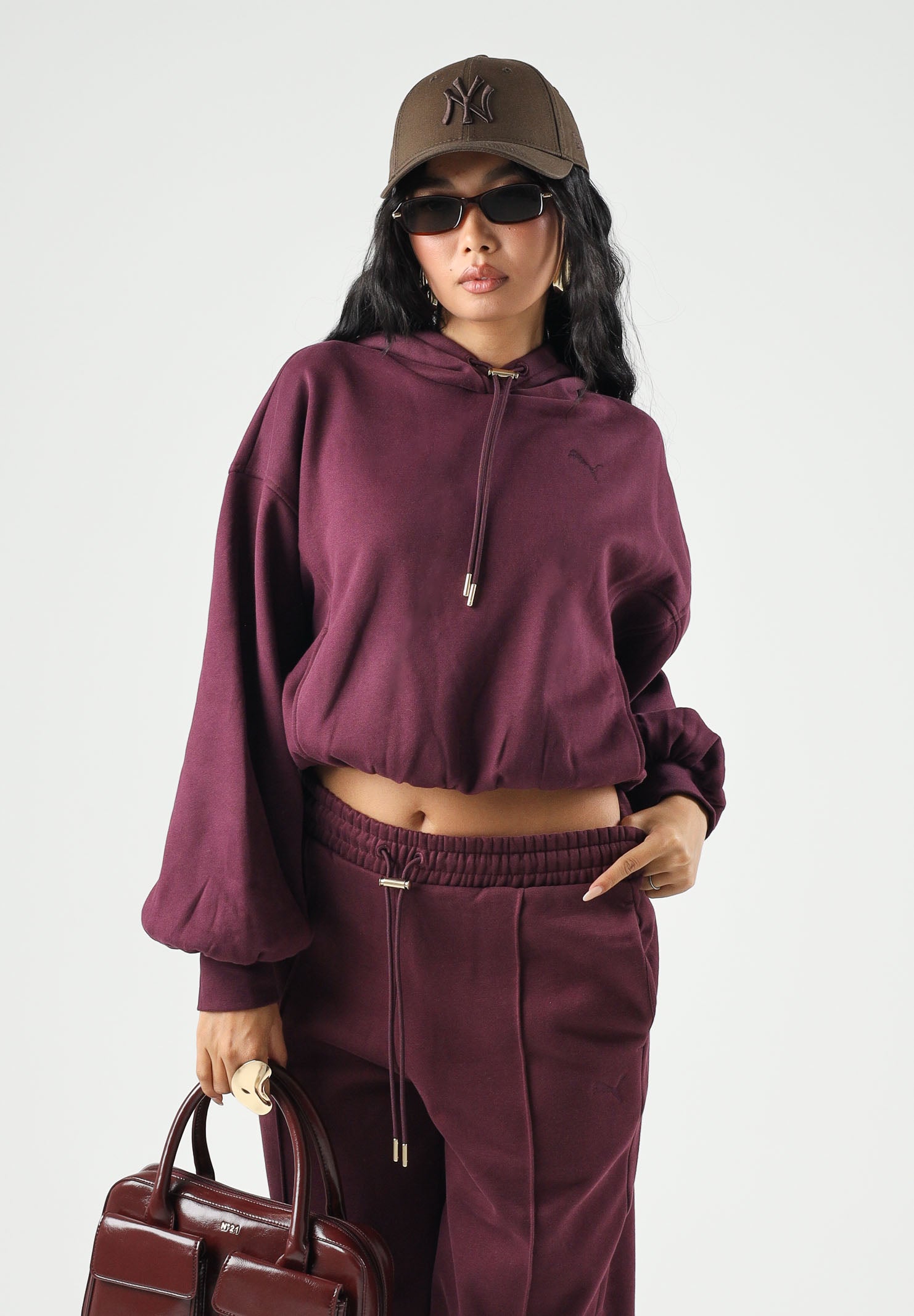 PUMA Felpa con cappuccio HOODIE bordeaux da donna con maniche a palloncino<BR/> 694027 24 PUMA 