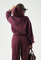 PUMA Felpa con cappuccio HOODIE bordeaux da donna con maniche a palloncino<BR/> 694027 24 PUMA 