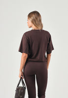 PUMA T-shirt RELAXED marrone da donna taglio cropped con maniche ampie e spacchetti laterali. 694030 33 PUMA 