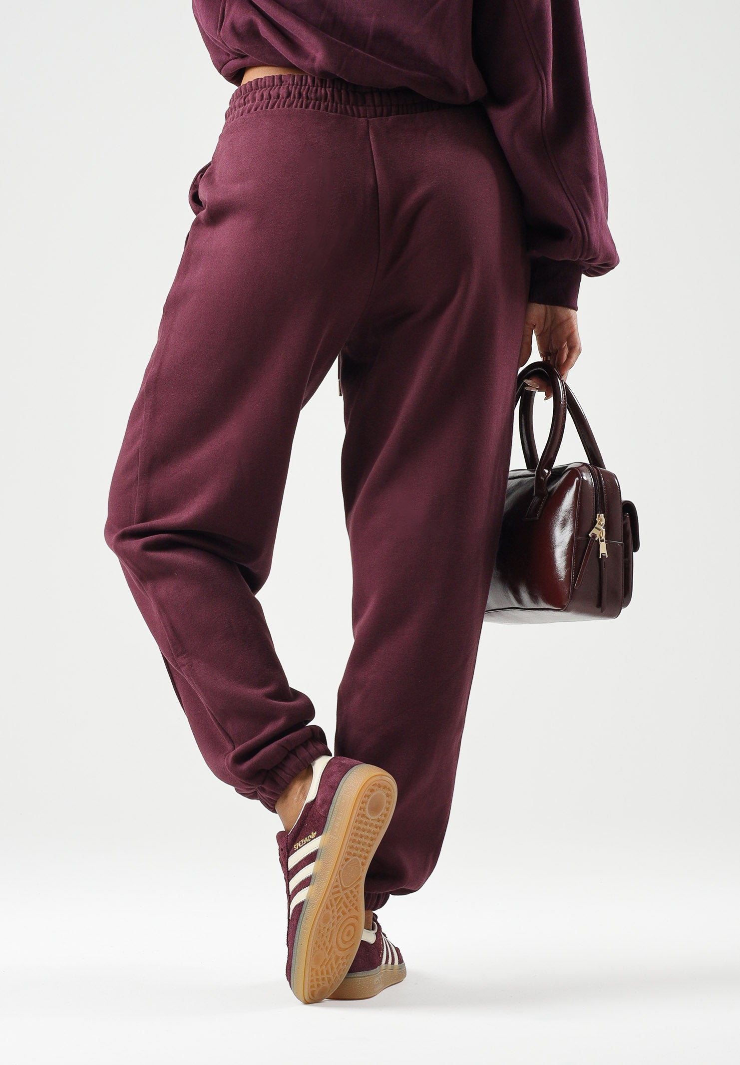 PUMA Pantaloni sportivi SWEATPANTS  bordeaux da donna con coulisse in vita e cucitura centrale 694032 24 PUMA 