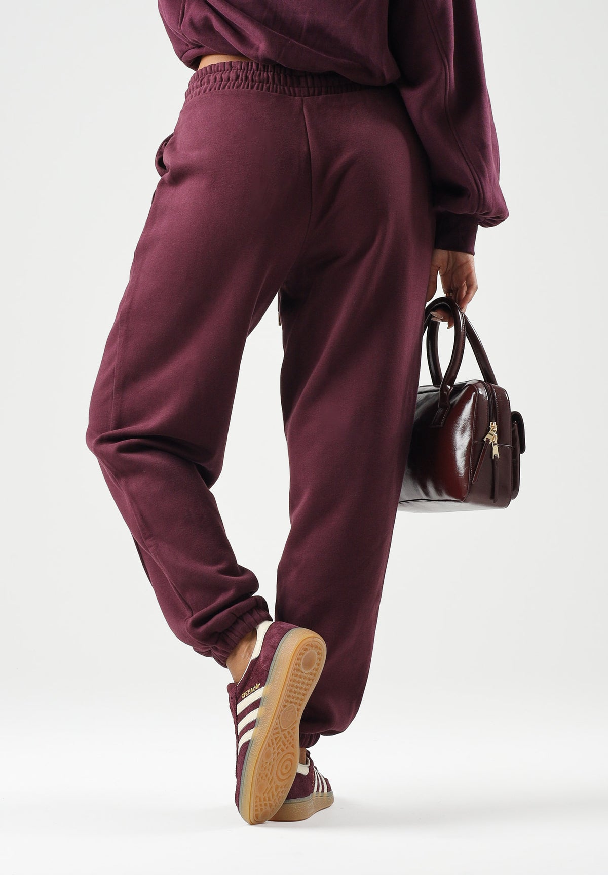 PUMA Pantaloni sportivi SWEATPANTS  bordeaux da donna con coulisse in vita e cucitura centrale 694032 24 PUMA 