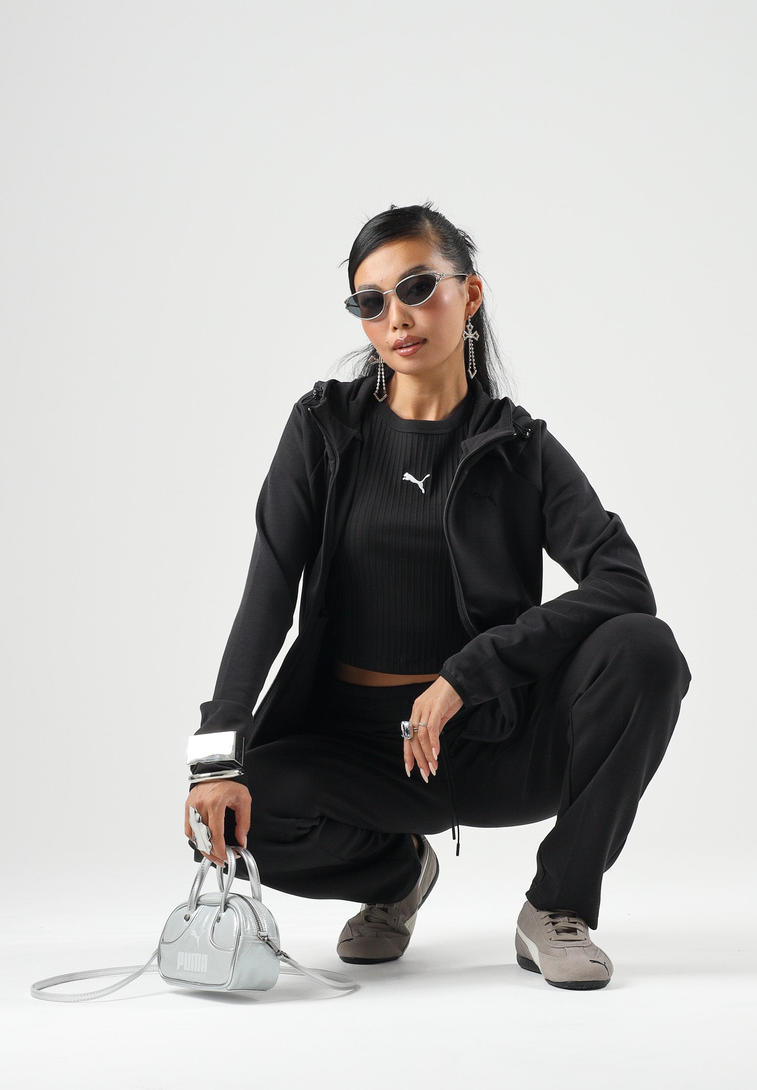 PUMA Felpa con zip EVOSTIPE FULL-ZIP HOODIE nero da donna con cappuccio integrato e tasche oblique. 694039 01 PUMA 