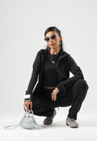 PUMA Felpa con zip EVOSTIPE FULL-ZIP HOODIE nero da donna con cappuccio integrato e tasche oblique. 694039 01 PUMA 