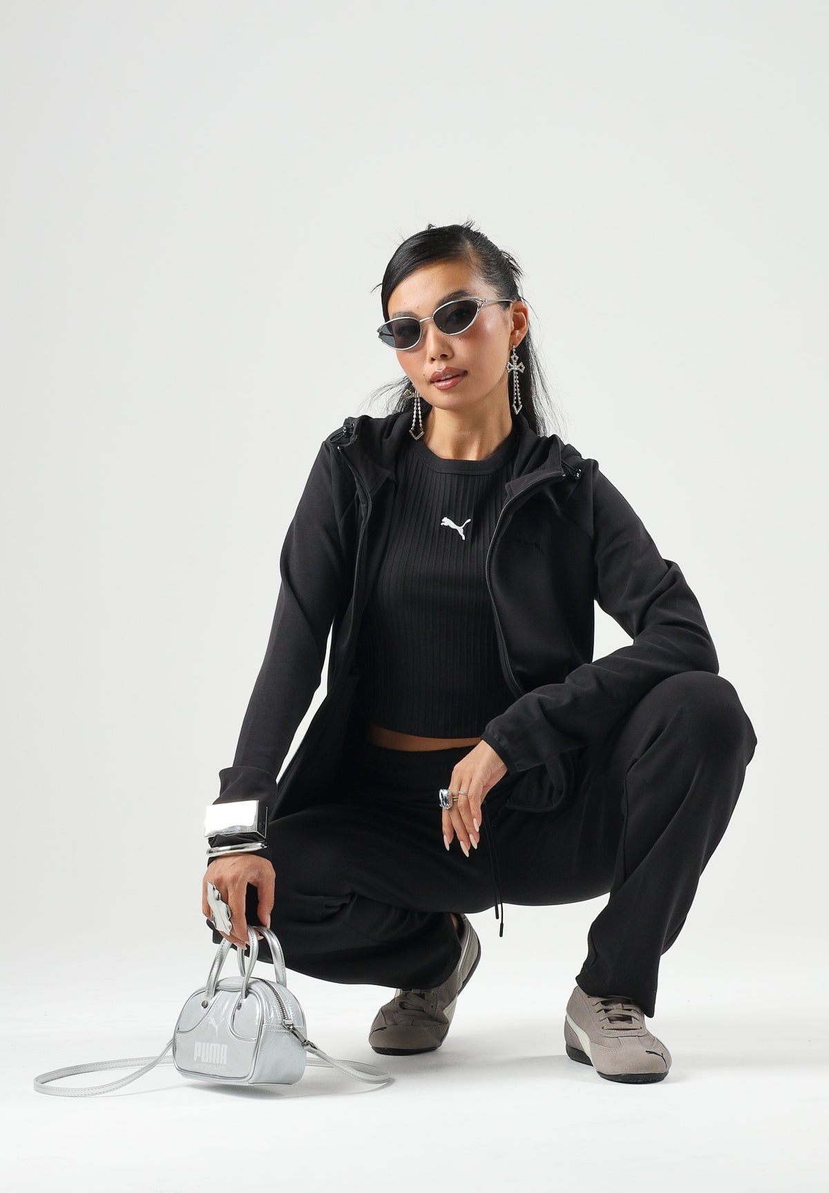PUMA Felpa con zip EVOSTIPE FULL-ZIP HOODIE nero da donna con cappuccio integrato e tasche oblique. 694039 01 PUMA 