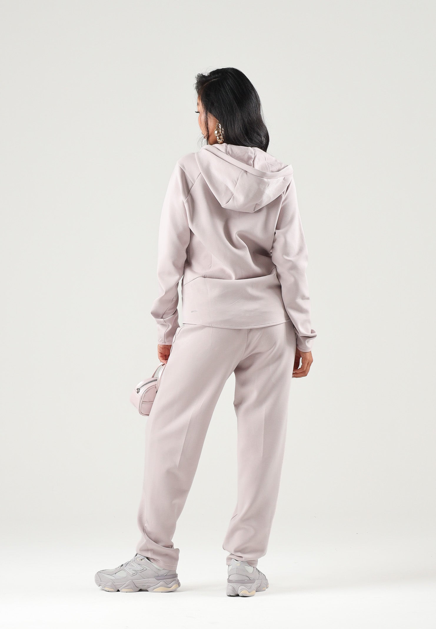 PUMA Felpa con zip EVOSTIPE FULL-ZIP HOODIE rosa da donna con cappuccio integrato e tasche oblique. 694039 49 PUMA 