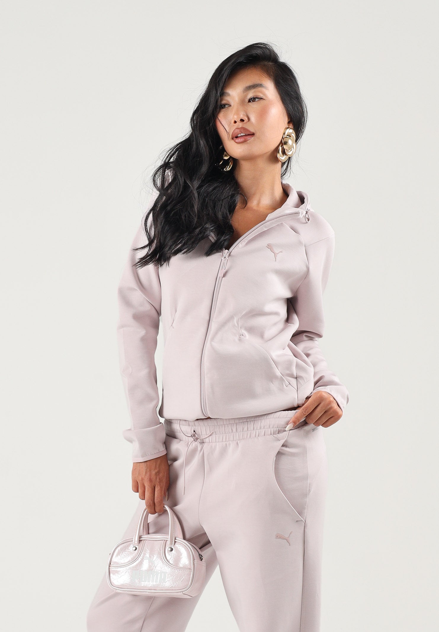 PUMA Felpa con zip EVOSTIPE FULL-ZIP HOODIE rosa da donna con cappuccio integrato e tasche oblique. 694039 49 PUMA 