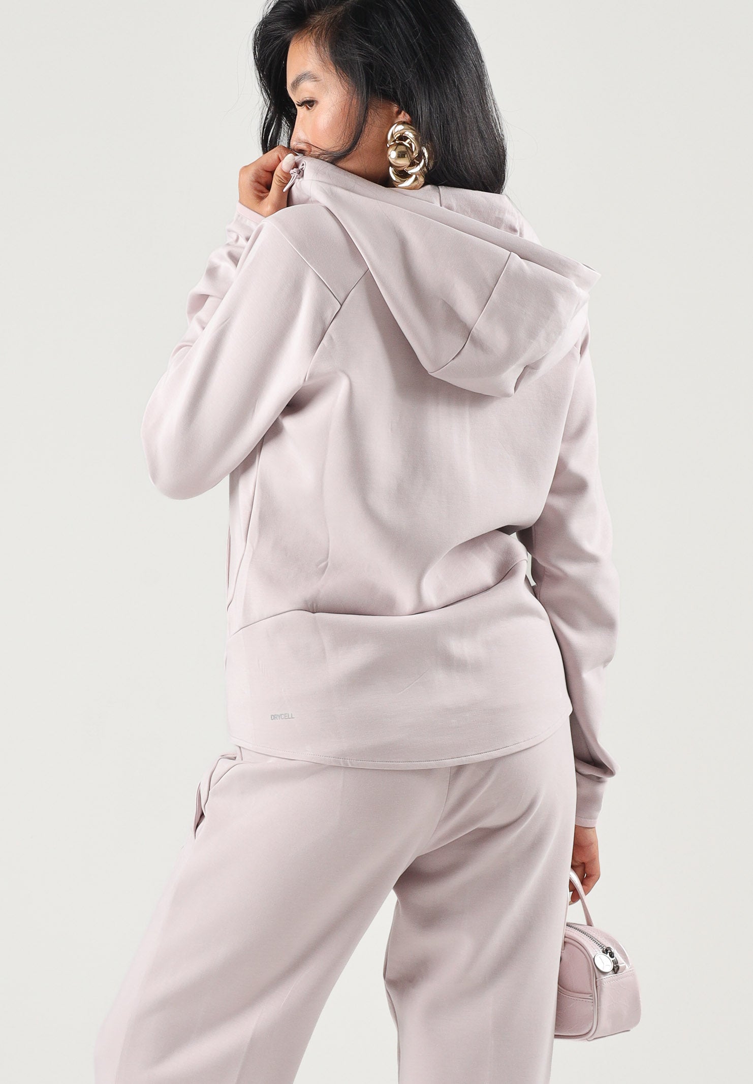 PUMA Felpa con zip EVOSTIPE FULL-ZIP HOODIE rosa da donna con cappuccio integrato e tasche oblique. 694039 49 PUMA 