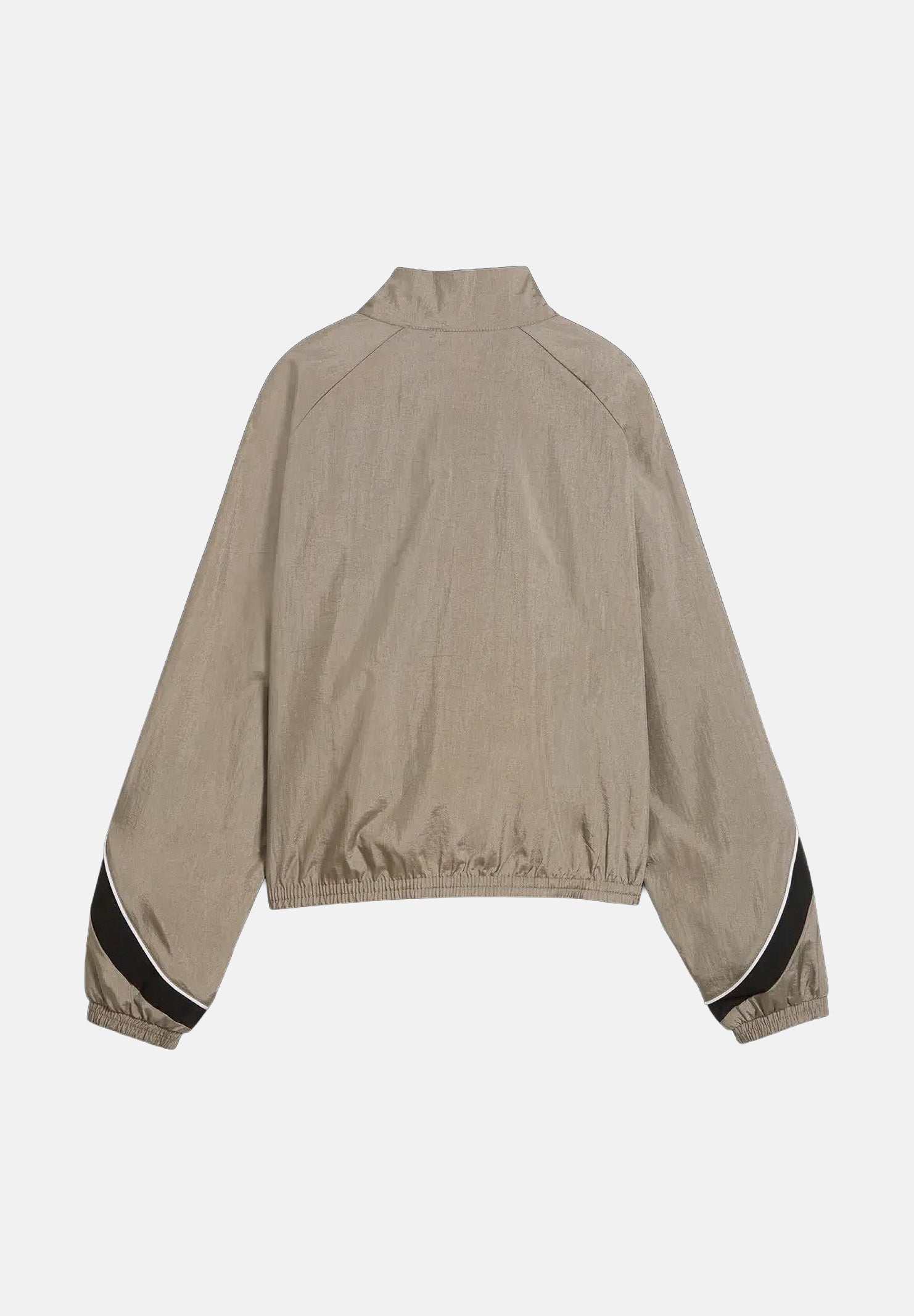 PUMA Giacca a vento DARE TO WOVEN TRACK  beige da donna con dettagli a contrasto e collo alto 694049 81 PUMA 