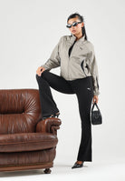 PUMA Giacca a vento DARE TO WOVEN TRACK  beige da donna con dettagli a contrasto e collo alto 694049 81 PUMA 