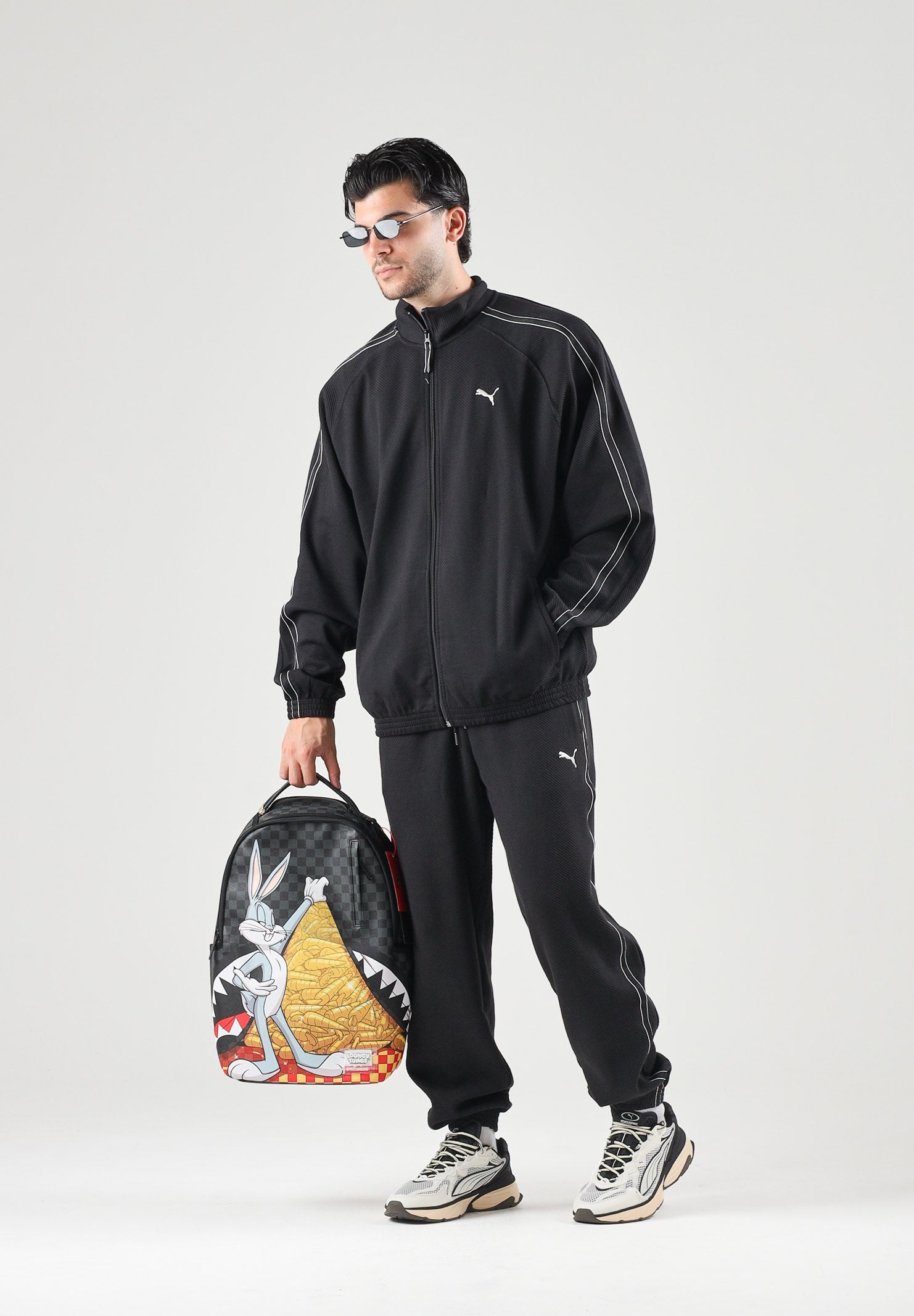 PUMA Felpa con zip TRACK JACKET nero da uomo con profilo bicolore e colletto rialzato. 694298 01 PUMA 