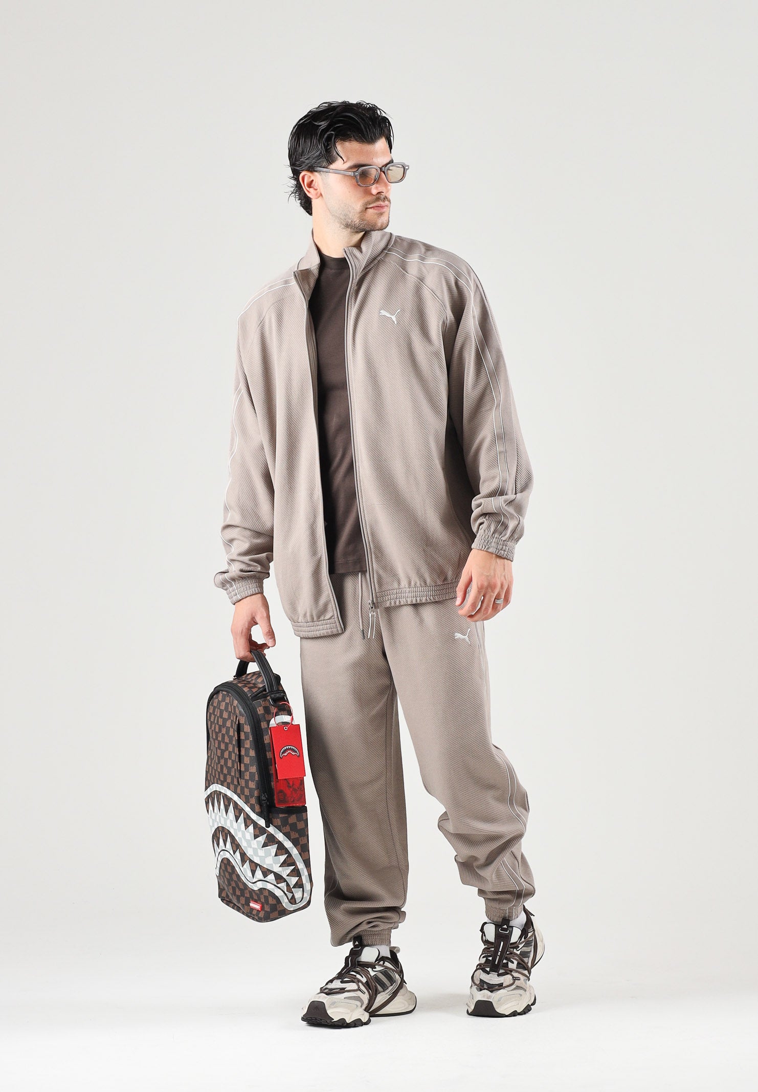 PUMA Felpa con zip TRACK JACKET beige da uomo con profilo bicolore e colletto rialzato. 694298 81 PUMA 