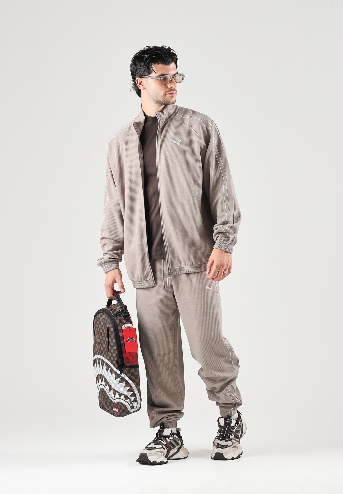 PUMA Felpa con zip TRACK JACKET beige da uomo con profilo bicolore e colletto rialzato. 694298 81 PUMA 