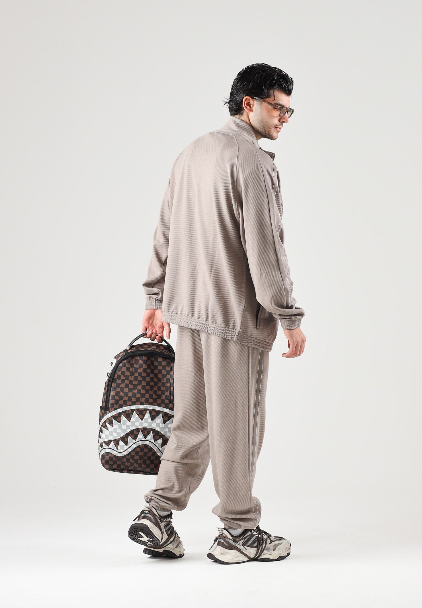 PUMA Felpa con zip TRACK JACKET beige da uomo con profilo bicolore e colletto rialzato. 694298 81 PUMA 