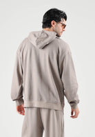 PUMA Felpa con cappuccio CLASSICS HOODIE beige da uomo con cappuccio integrato e tasca a marsupio. 694309 81 PUMA 