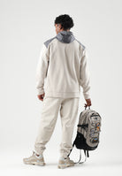 PUMA Felpa con zip PUMATECH  beige e grigio per uomo con cappuccio integrato e tasca sul petto. 694490 82 PUMA 