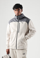 PUMA Felpa con zip PUMATECH  beige e grigio per uomo con cappuccio integrato e tasca sul petto. 694490 82 PUMA 