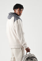 PUMA Felpa con zip PUMATECH  beige e grigio per uomo con cappuccio integrato e tasca sul petto. 694490 82 PUMA 
