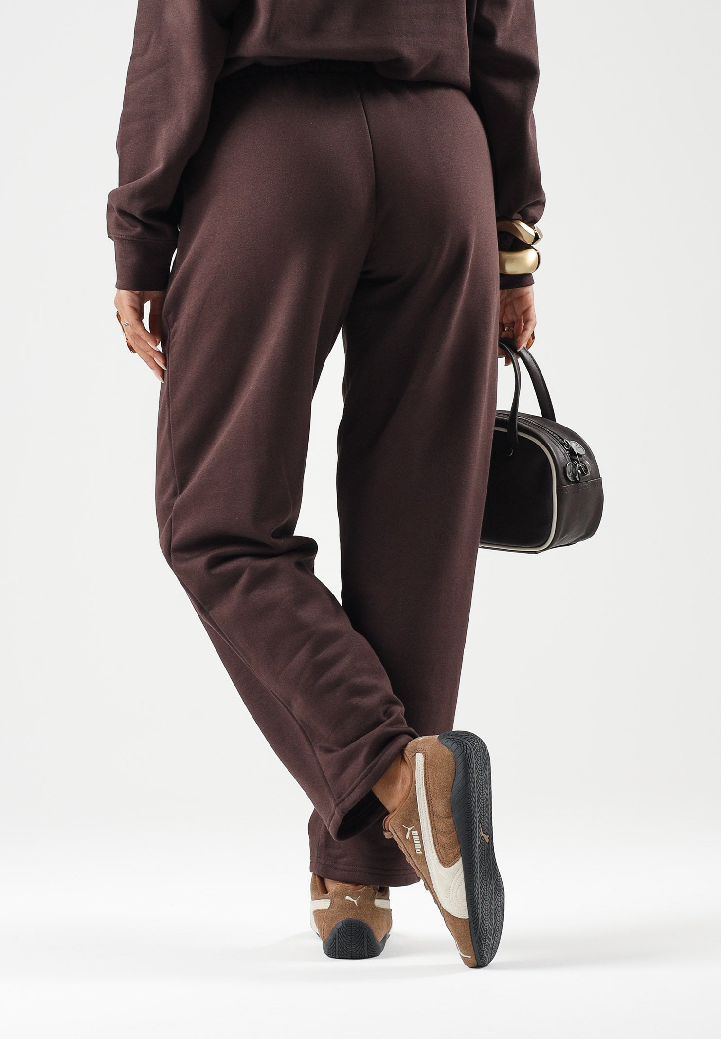 PUMA Pantaloni RHINESTON OPEN  marrone da doonna con logo in strass e fondo dritto. 694578 33 PUMA 