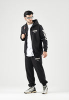 PUMA Tuta sportiva ESS HOODED SUIT nero da uomo con felpa zippata, cappuccio e pantaloni coordinati. 696906 01 PUMA 