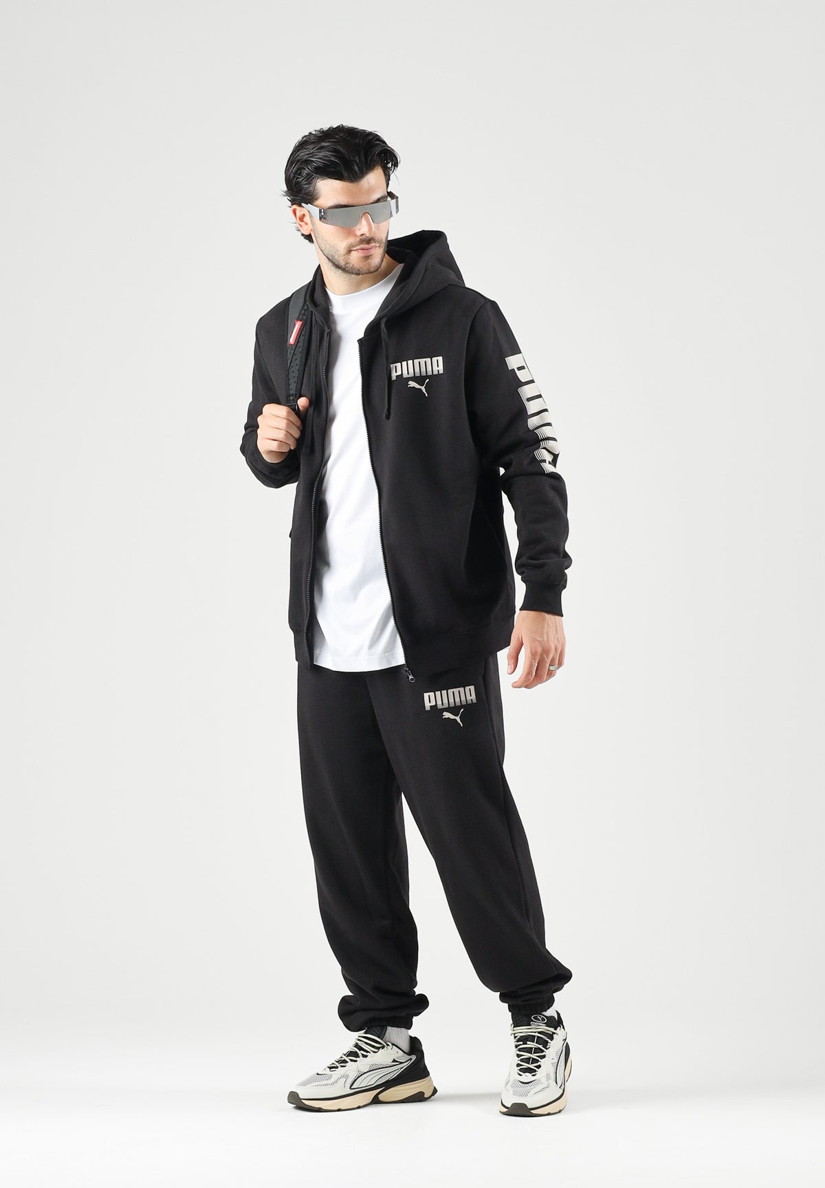PUMA Tuta sportiva ESS HOODED SUIT nero da uomo con felpa zippata, cappuccio e pantaloni coordinati. 696906 01 PUMA 