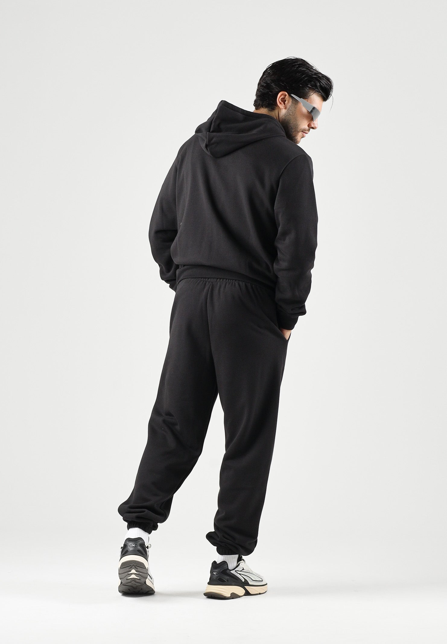 PUMA Tuta sportiva ESS HOODED SUIT nero da uomo con felpa zippata, cappuccio e pantaloni coordinati. 696906 01 PUMA 