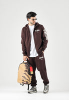 PUMA Tuta sportiva ESS HOODED SUIT marrone da uomo con giubbotto felpato zippato e pantaloni elastici. 696906 33 PUMA 