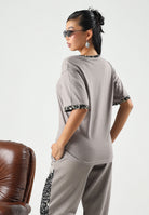 PUMA T-shirt manica corta DARE TO TEE beige  da donna con nastro logo sulle maniche 697032 81 PUMA 